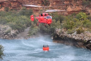 A Serbian Kamov Ka-32 firefighting helicopter collects water