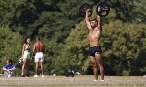 A man exercises in Hyde Park in London
