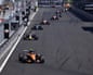 Formula 1 cars race in a line during the Spanish Grand Prix in Madrid