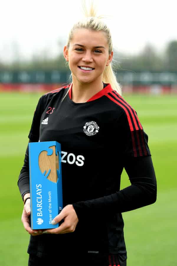 Alessia Russo with the award for being named the WSL player of the month for March.