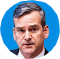 man in suit with blue background