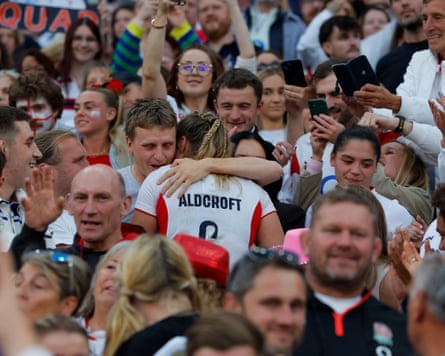 England captain, Zoe Aldcroft, embraces someone in the crowd after England won the Women’s Rugby World Cup 2025 final.