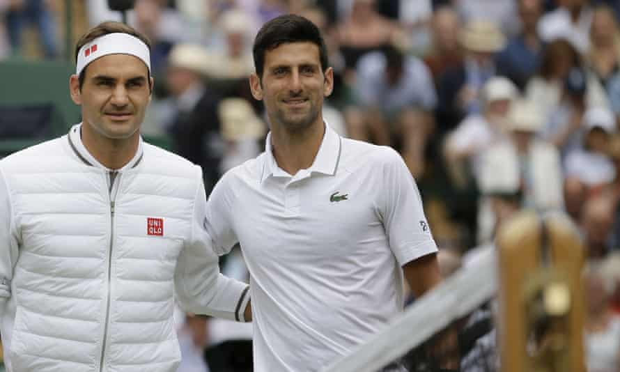Switzerland’s Roger Federer (left) and Serbia’s Novak Djokovic poses before the men’s singles final match of the Wimbledon Tennis Championships in July 2019.
