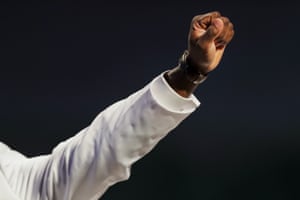 Philonise Floyd gives a salute during the funeral for his brother George.