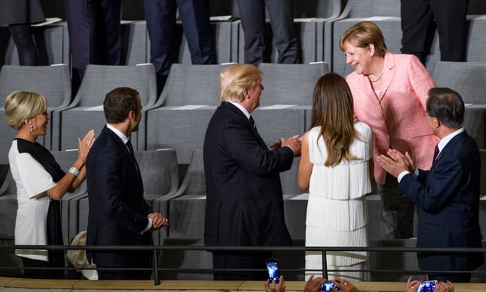 Brigitte and Emmanuel Macron, Donald and Melania Trump, Angela Merkel and Moon Jae-in.