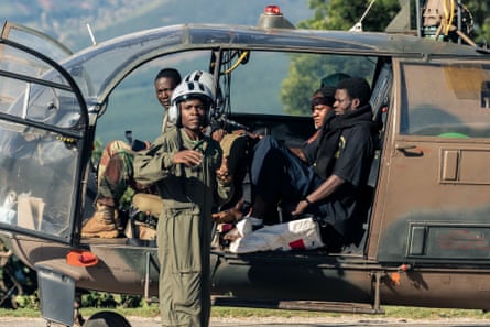 A man with an injured foot arrives at a temporary medical camp in Chimanimani after he was rescued by the Air Force of Zimbabwe.