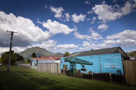 A mural showing Kawerau’s Tasman mill painted on a wall