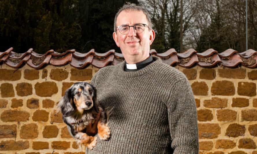 Coles at the vicarage where he lives with his two dachshunds Daisy and Pongo.