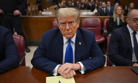 Donald Trump sits in the courtroom as his criminal trial continues over charges that he falsified business records to conceal money paid to silence porn star Stormy Daniels.
