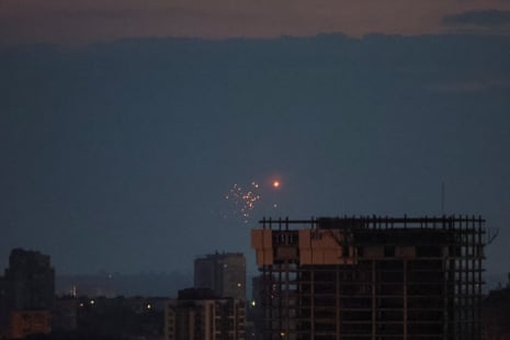 An explosion is seen in the sky over Kyiv.