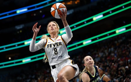 Sophie Cunningham of the Indiana Fever goes to the basket against the Dallas Wings