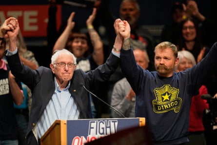 two men holding hands