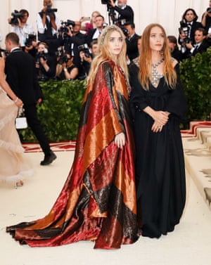 Met Gala regulars Mary-Kate and Ashley Olsen wore floorsweeping vintage gowns from Paco Rabanne, accessorising with religious beads and crucifixes