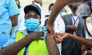 A health worker receives the Oxford AstraZeneca vaccine in Kenya