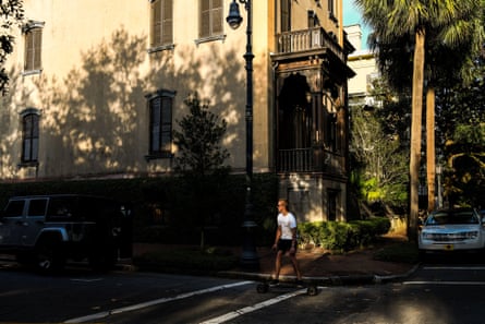 A man rides his skateboard around the Historic District in Savannah, Georgia, amid the novel coronavirus pandemic on April 25, 2020.