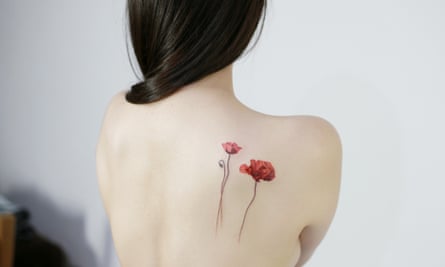 Two roses on a woman’s back
