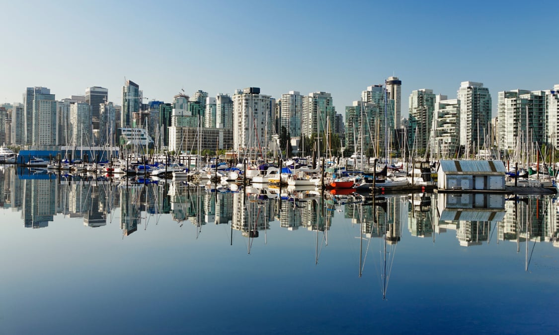 Buildings line Coal Harbour in Vancouver, where property prices rose by 39% in the year before a tax on overseas investors was implemented.
