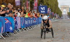 David Weir of Great Britain exits the Champs Elysees in the men's T54 marathon.