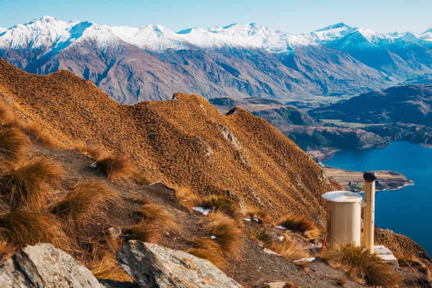A small cylindrical toilet on Roys Peak Track, near the Wanaka viewpoint, popular for photography.