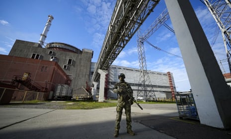 A Russian serviceman guards at the Zaporizhzhia nuclear power station.