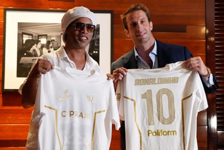 Ronaldinho (left) holds up a jersey along with Ignazio Cipriani, president of Ravenna FC, at a media event in Miami in June.