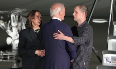 Kamala Harris and Joe Biden greet reporter Evan Gershkovich.