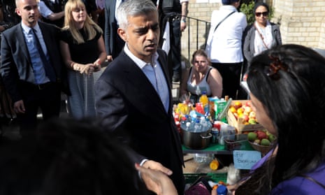  The mayor of London, Sadiq Khan, meets people near the scene of the Grenfell Tower fire.