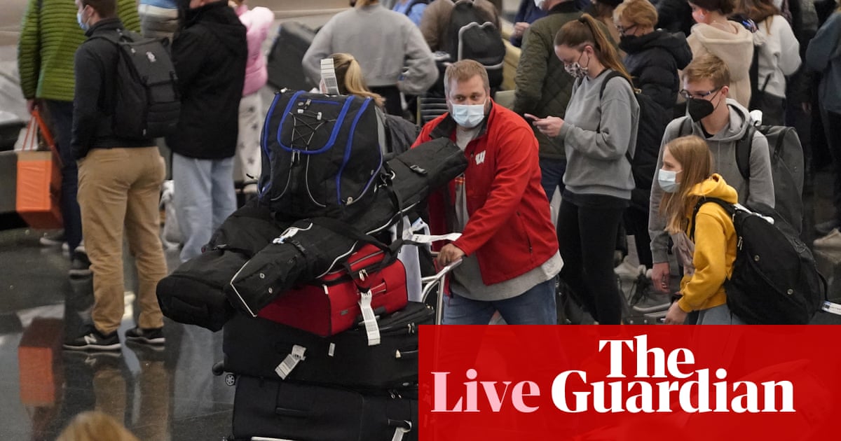 Covid live news: travel chaos as 3,500 more flights cancelled; fresh curbs in France