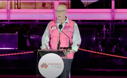 Dutton in a pink hi-vis vest