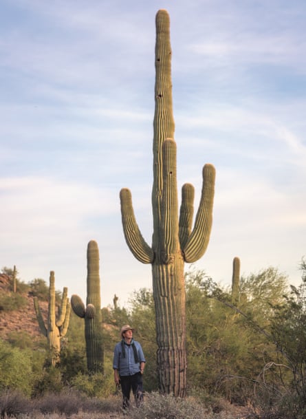 Monty Don standing by great saguaro cacti in the Sonoran Desert near Phoenix,Arizona.