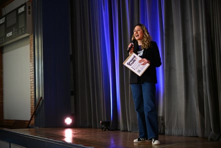 a women holding a microphone