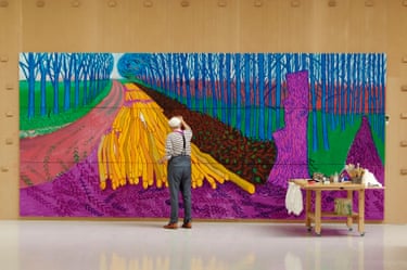 Hockney painting Winter Timber, 2009This work, full of striking Fauvist hues, marks a triumphal phase of Hockney’s late career as he produced large-scale paintings seeking to capture the dramatic beauty he saw in the Yorkshire landscape. Strong verticals dominate the top of the painting, contrasting with the felled trees beneath and lane sweeping left. “Winter is all about line,” he once said. “People have it all wrong, imagining it to be a time when the world goes all dead. Trees are never more alive than in winter. You can virtually see the life force.”