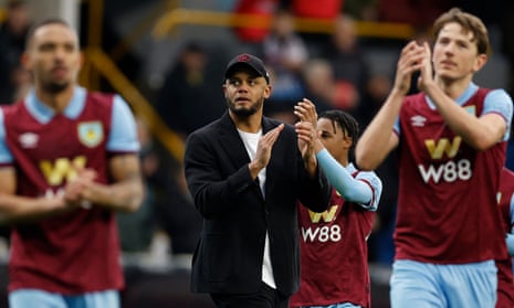 Vincent Kompany and Burnley players applaud fans after a match
