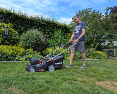 Andy Shaw mowing his lawn