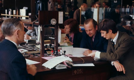 Employees busy working inside Lloyd’s of London in the early 1960’s.