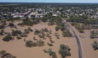 Australia news live: towns threatened by south-west Queensland floods; ‘substantial changes’ to mergers regime