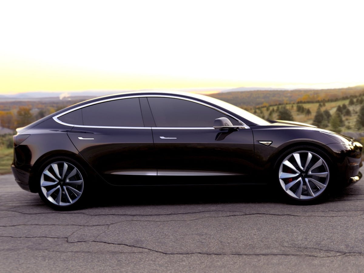 First Tesla Model 3 Rolls Off Production Line Into The Hands Of Elon Musk Tesla The Guardian