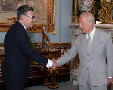 Burnham and Charles shake hands