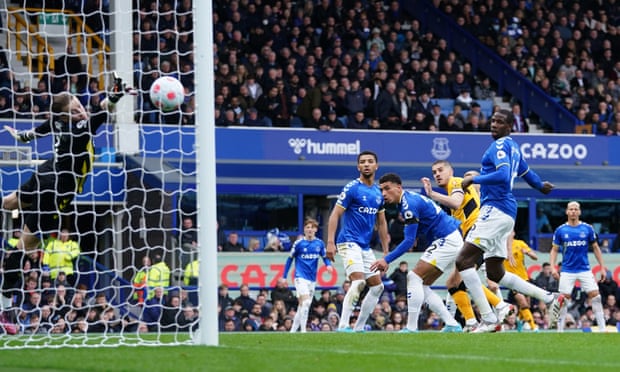 Wolves’ Conor Coady sees his header find the Everton net