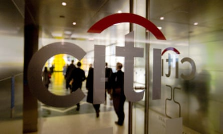 Staff enter the Citigroup building in London’s Canary Wharf