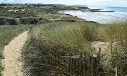 Sand dunes down to the sea