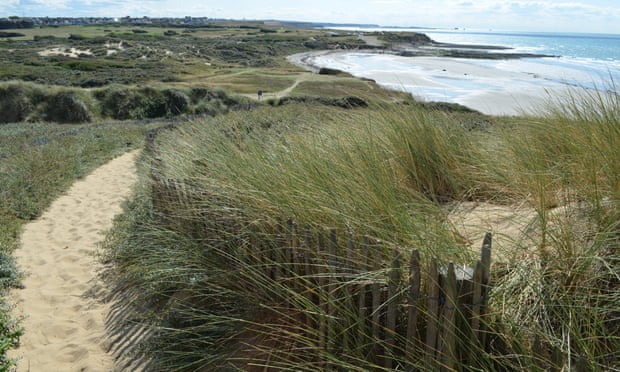 Sand dunes down to the sea
