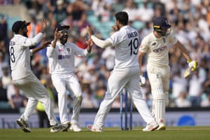India’s Umesh Yadav celebrates taking the wicket of Chris Woakes.
