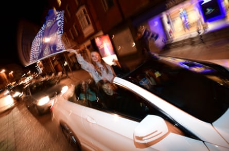 Leicester City fans celebrate in their cars after their team’s improbable title win.