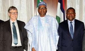 The Nigerian president Mohammadu Buhari is flanked by Bill Gates, left, and Aliko Dangote