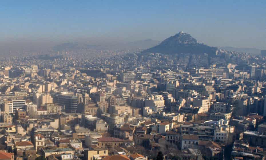 Smog settles over central Athens.