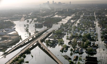 Floodwaters from Hurricane Katrina fill the streets near downtown New Orleans. This summer the city suffered two so-called 100-year storms over just two months.