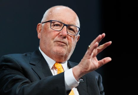 Pete Hoekstra gestures with his hand while speaking at a fireside chat