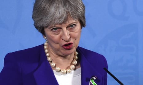 Theresa May pulling twisted features face