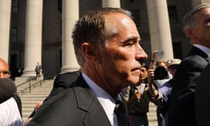 Chris Collins walks out of a New York court house after being charged with insider trading.